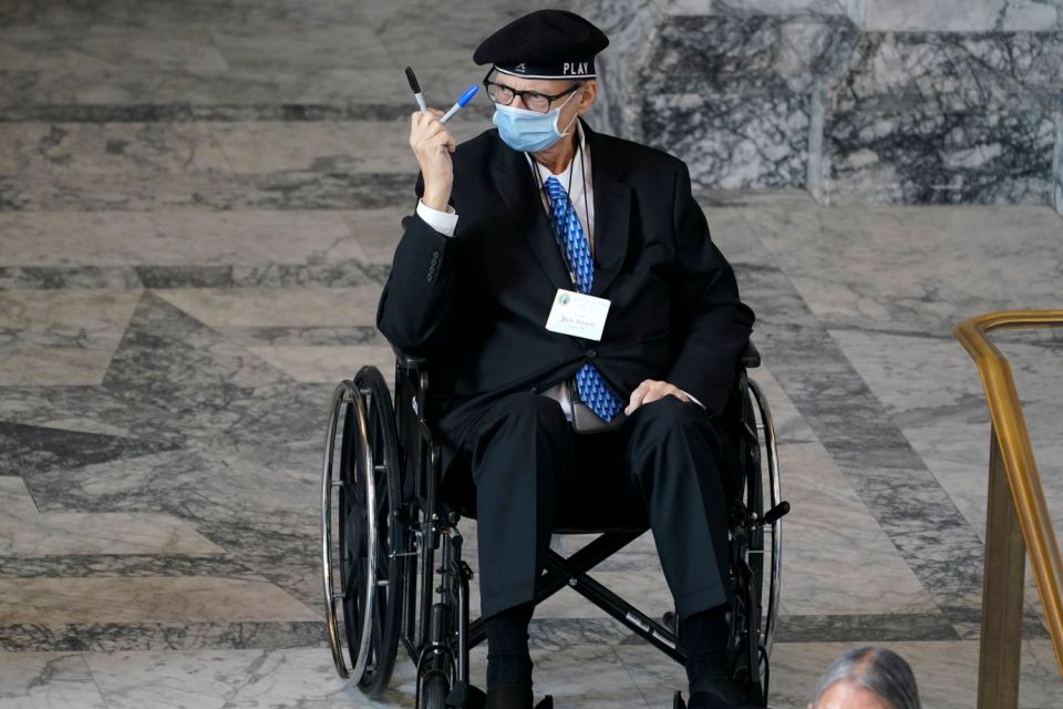 Washington state elector with terminal health issue tears up after voting for biden