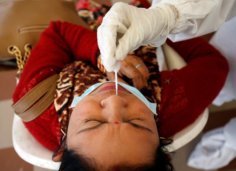 Vaccine 'hesitancy' rises among Indians as virus cases fall - survey