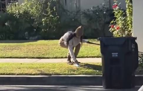 Mia Khalifa 'Caught' Picking Up Poo With Mask Before Putting It Back On