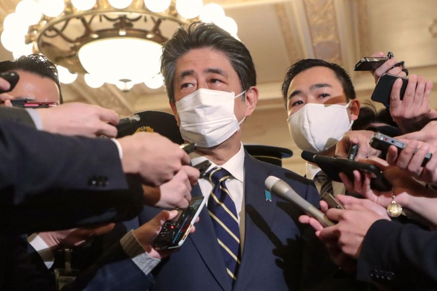 Japan ex-premier Abe questioned by prosecutors on party funding