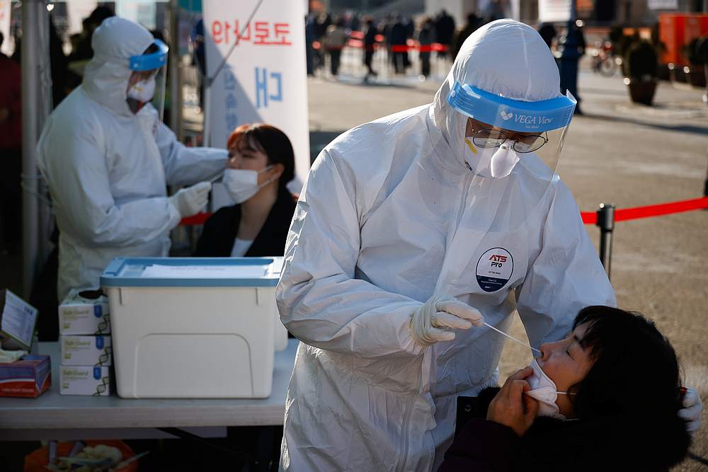 S.Korean regions brush off outcry, mandate coronavirus testing for foreign workers