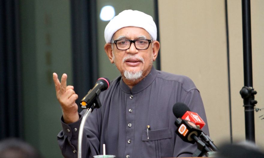 Malaysia's PAS president Abdul Hadi Awang steps in to mend allies Umno, Bersatu ties