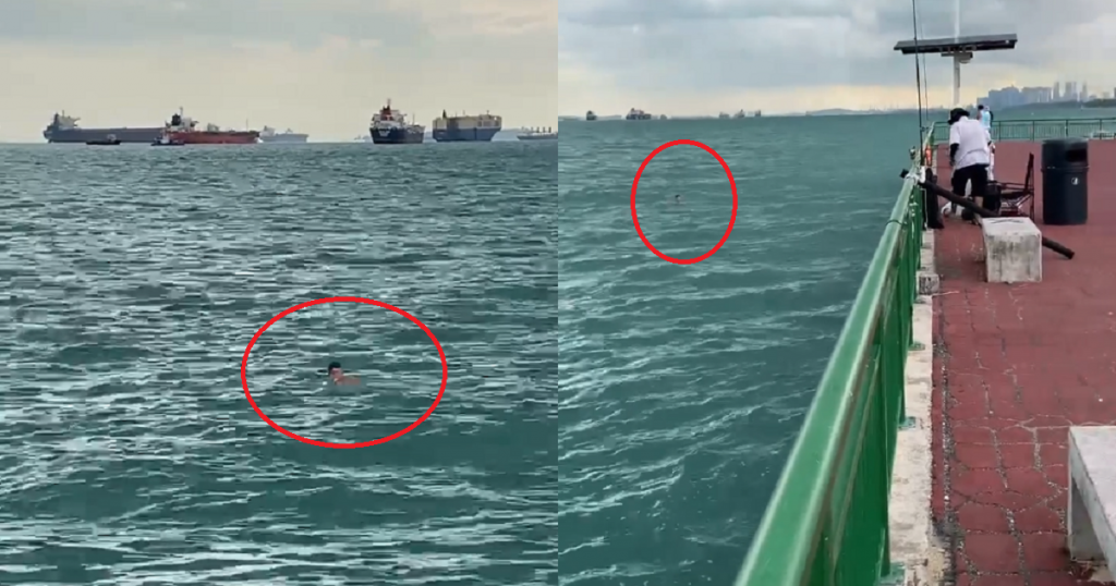 Man swims ver far off bedok jetty. Swim close to fishing lines