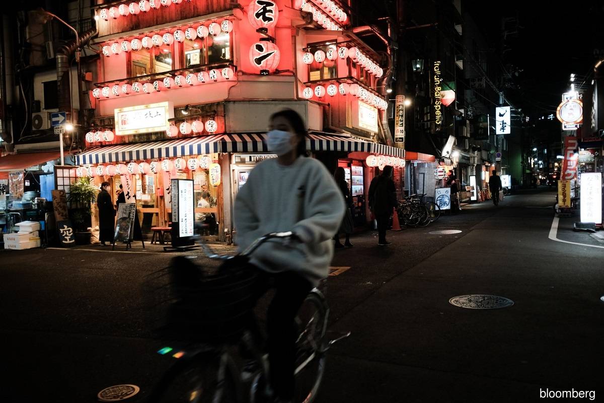 Japan moves closer to declaring virus emergency in Tokyo, Osaka