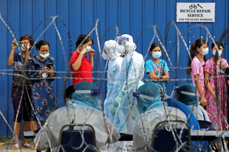 Malaysia to reimpose 2-week limited lockdown to stem virus spread
