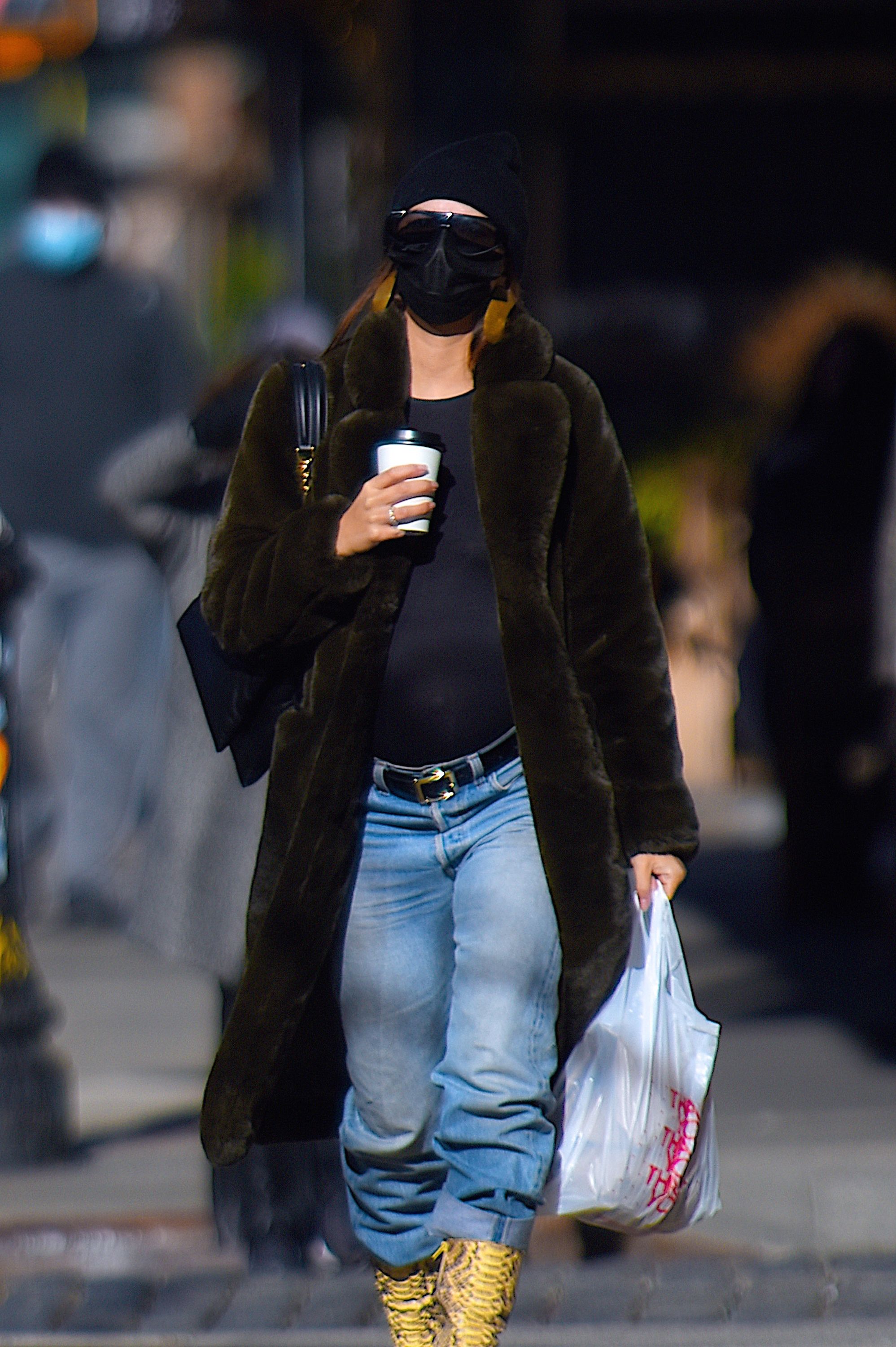 Emily Ratajkowski's Latest Chic Maternity Look Includes a Faux Fur Coat and Yellow Yeezy Boots
