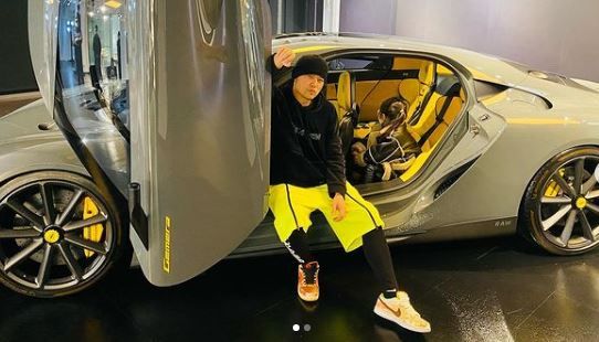 Jay Chou poses with daughter in front of RM6.8mil super sports car