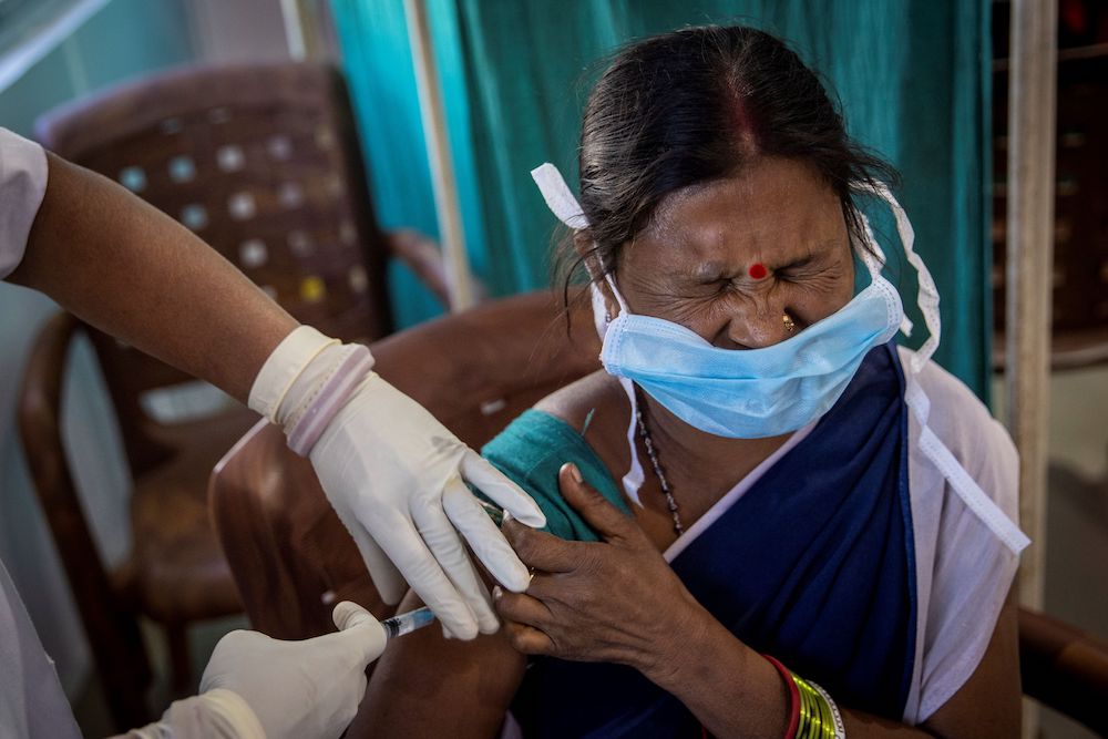 ‘Instead we pray’: Fearing lost wages, India’s urban poor shun Covid-19 vaccine