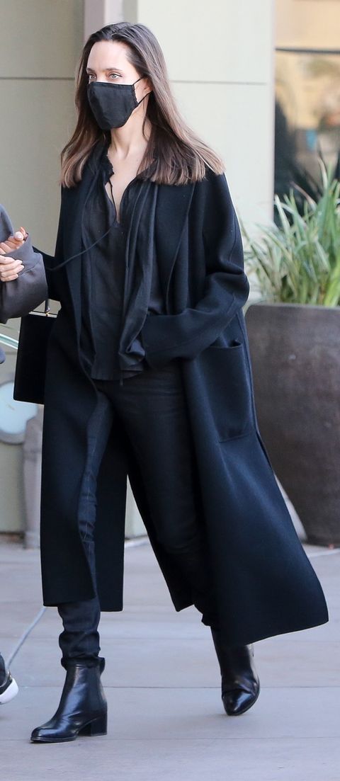 Angelina Jolie Stuns in a Sheer Shirt, Skinny Jeans, and Leather Boots