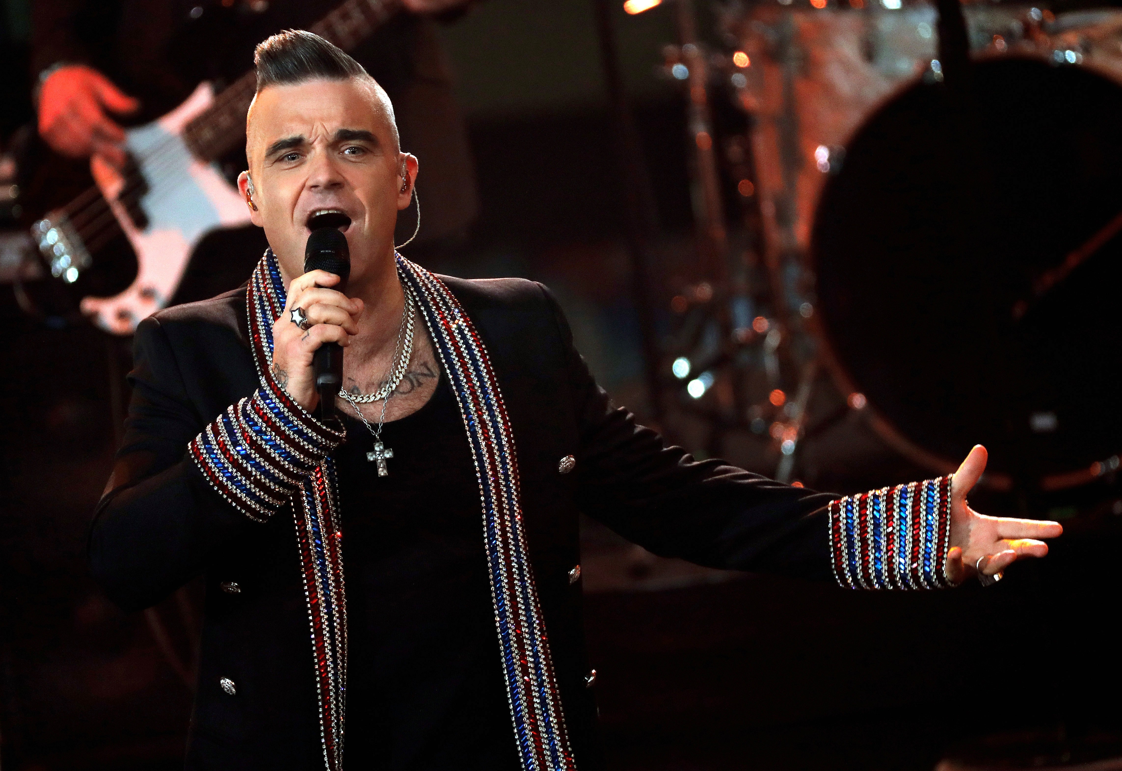 Robbie Williams ‘tests positive for coronavirus and is quarantining in Caribbean’