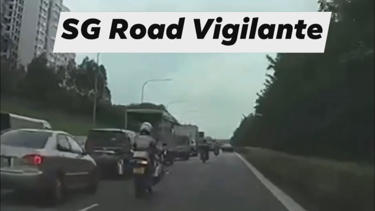 singapore traffic police force fail to check for oncoming traffic before changing lane.