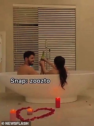 Saudi influencer sparks outrage by posting image of herself naked in the bath with her husband to 'celebrate her account being verified'
