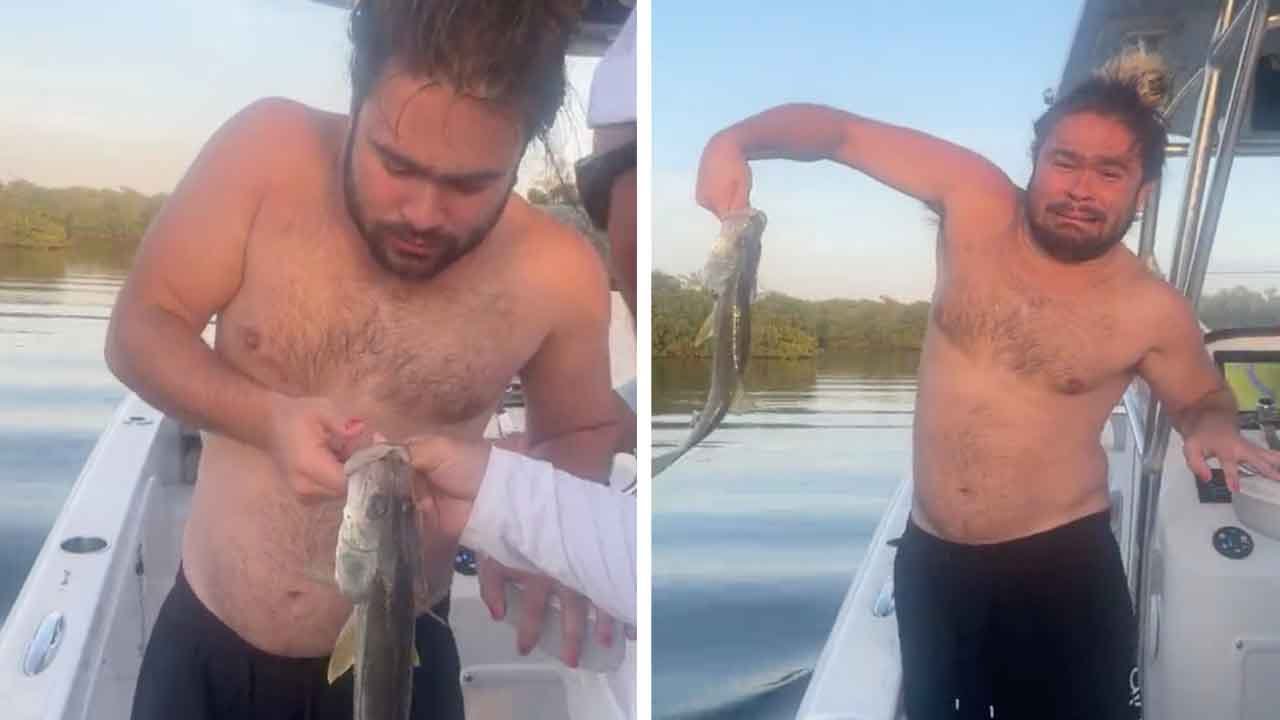Guy Freaks Out Whilst Holding Fish For Photo