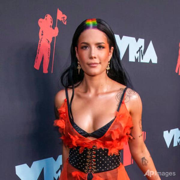 Singer Halsey pregnant with 1st child, shares photos of baby bump