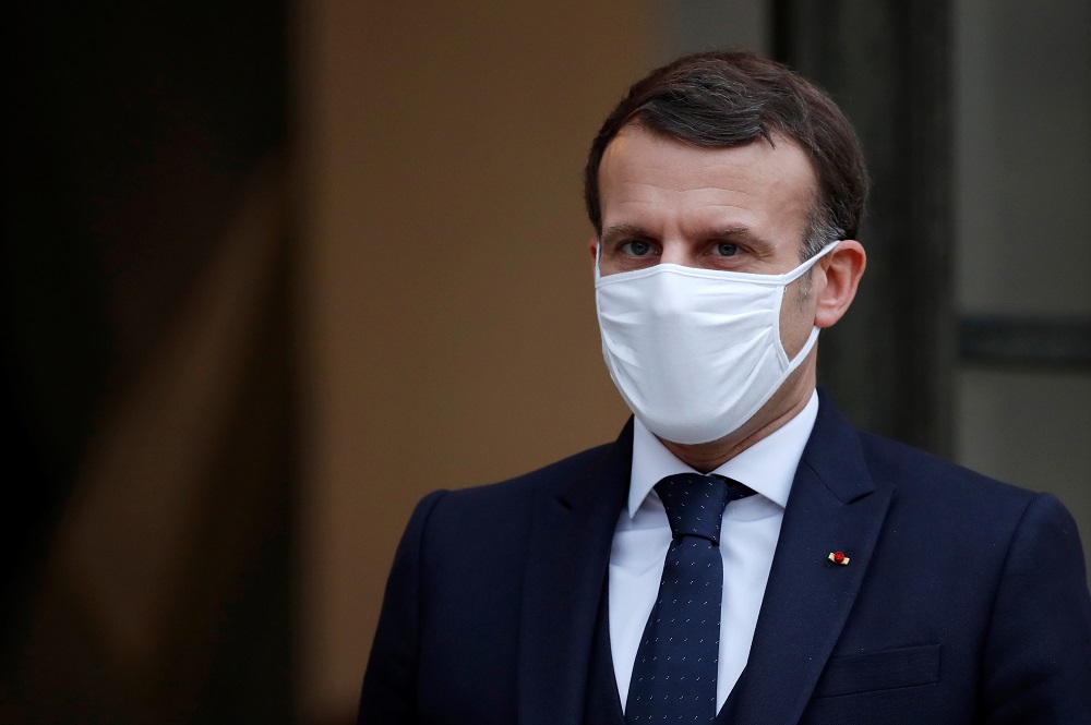 Macron announces school closures in France and defends strategy