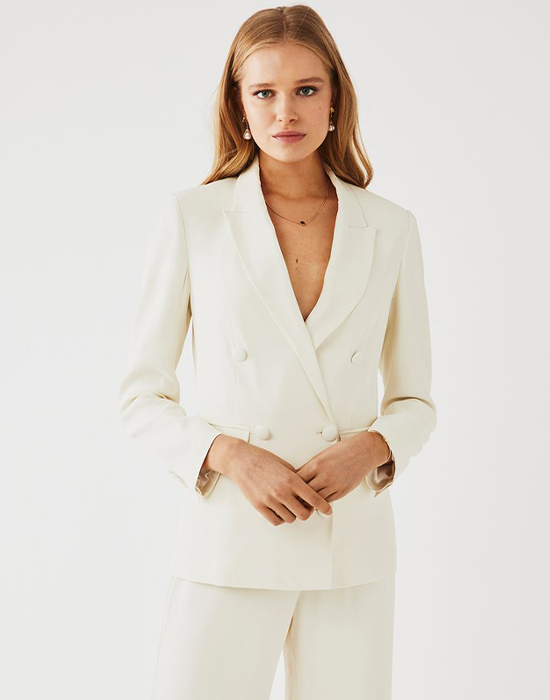 9 of the best bridal suits: Ditch the wedding dress like Laura Whitmore and Millie Mackintosh