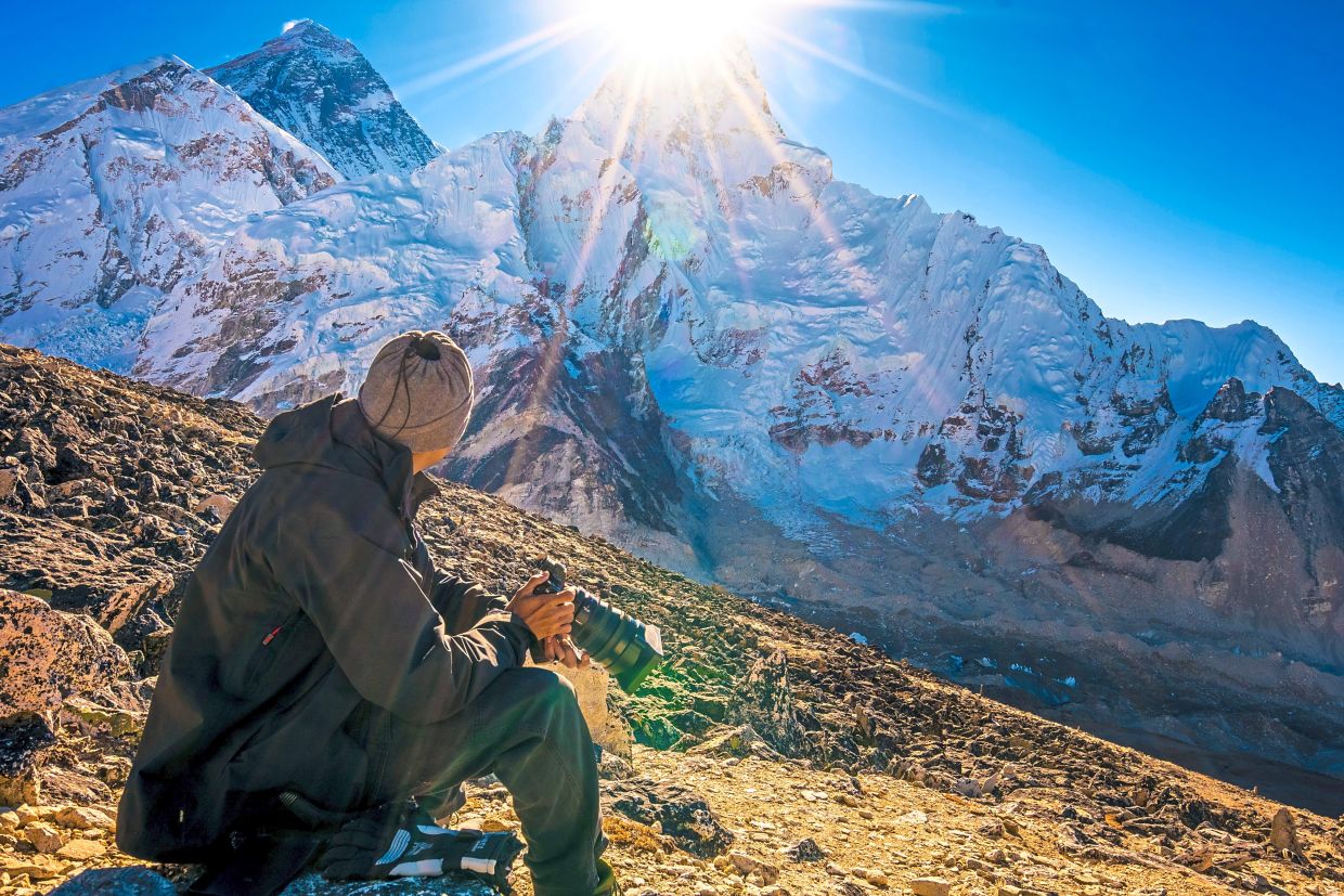 Malaysian who cycled over 30,000 km around the world shares his adventures on YouTube