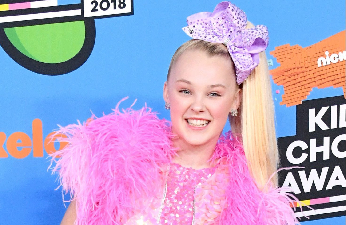 How old is JoJo Siwa and what is she famous for?