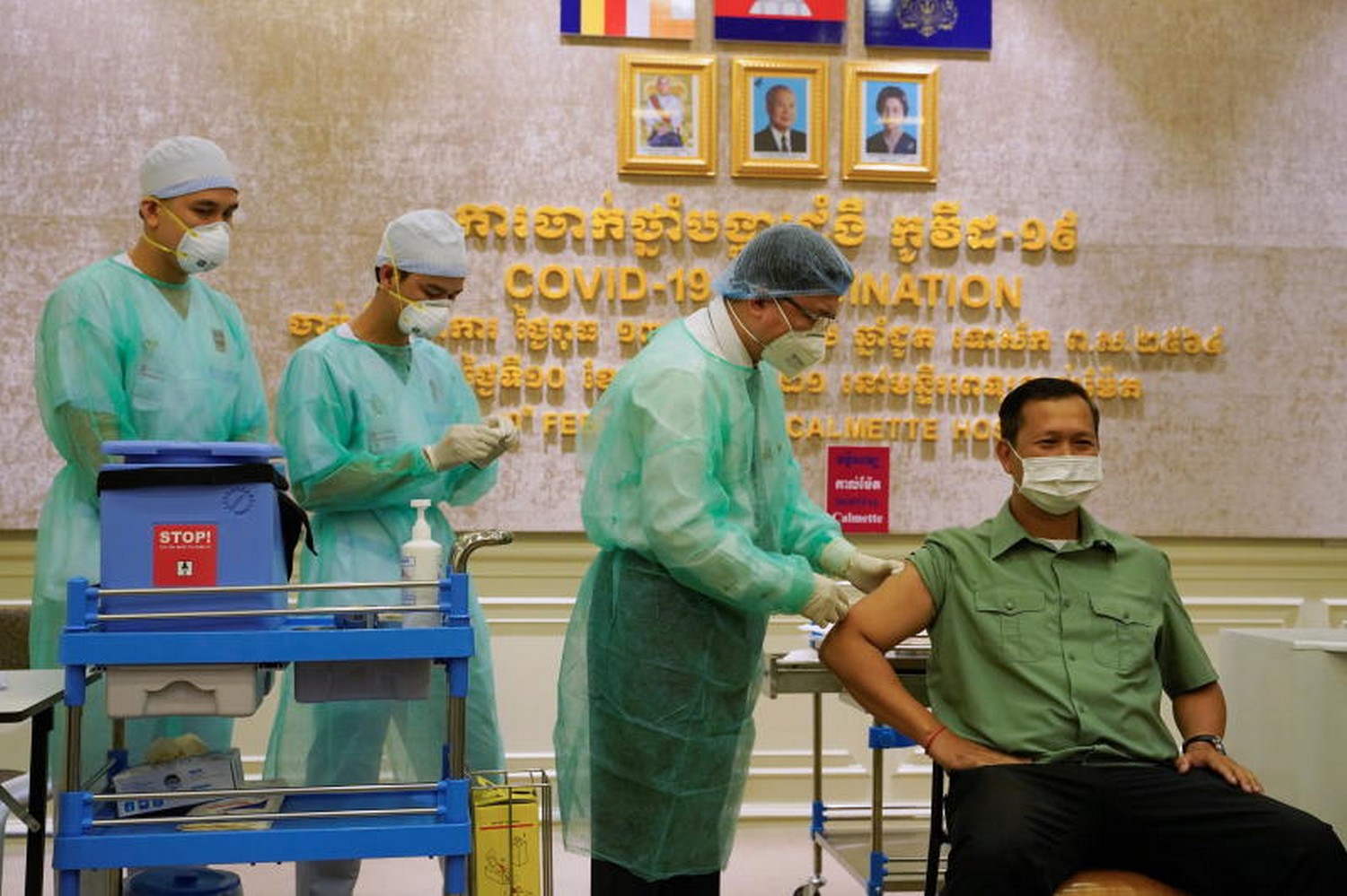 Cambodia begins Covid-19 vaccinations with shots for PM's sons, ministers