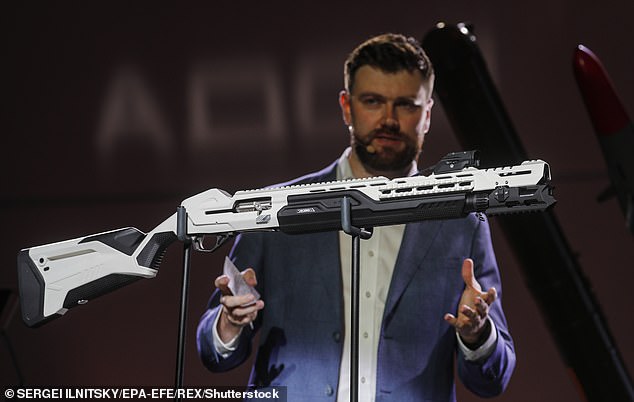The hipster shotgun: Kalashnikov unveils 'gadget shotgun' with built-in computer and video camera aimed at Gen Z customers who can't bear to be away from tech 