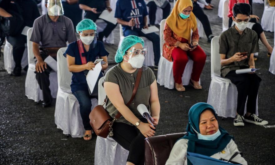 Indonesia's vaccine rollout comes up against cold reality of limited logistics