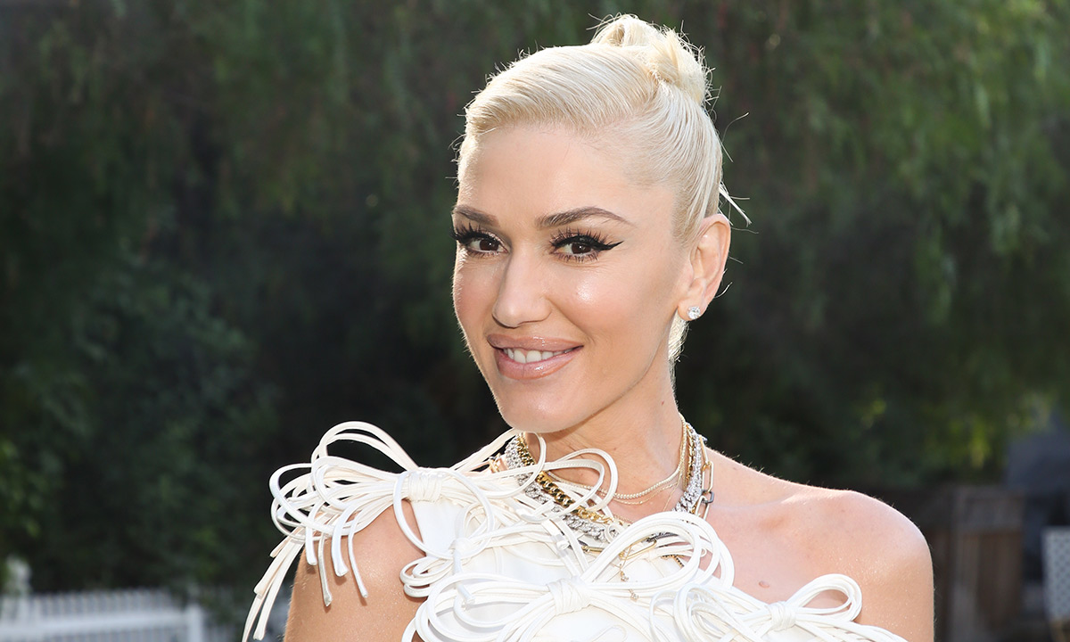 Gwen Stefani wows in pretty pink dress as she teases exciting news
