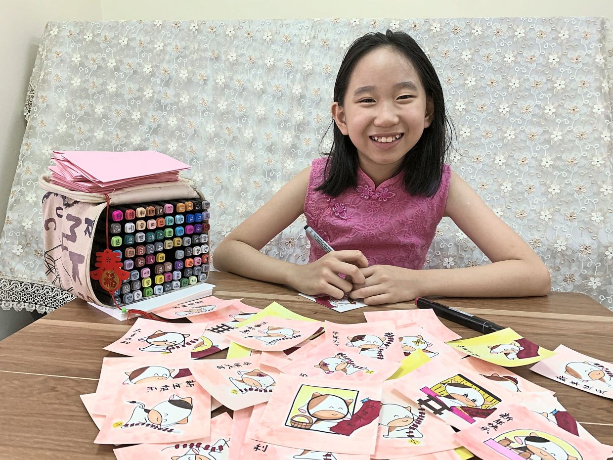 11-year-old raises RM713 with hand-drawn CNY cards