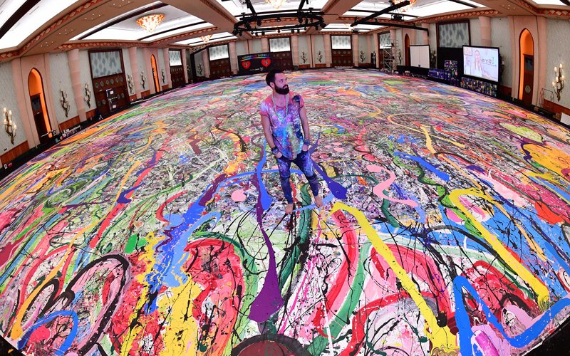 UK artist unveils world’s largest painting on canvas