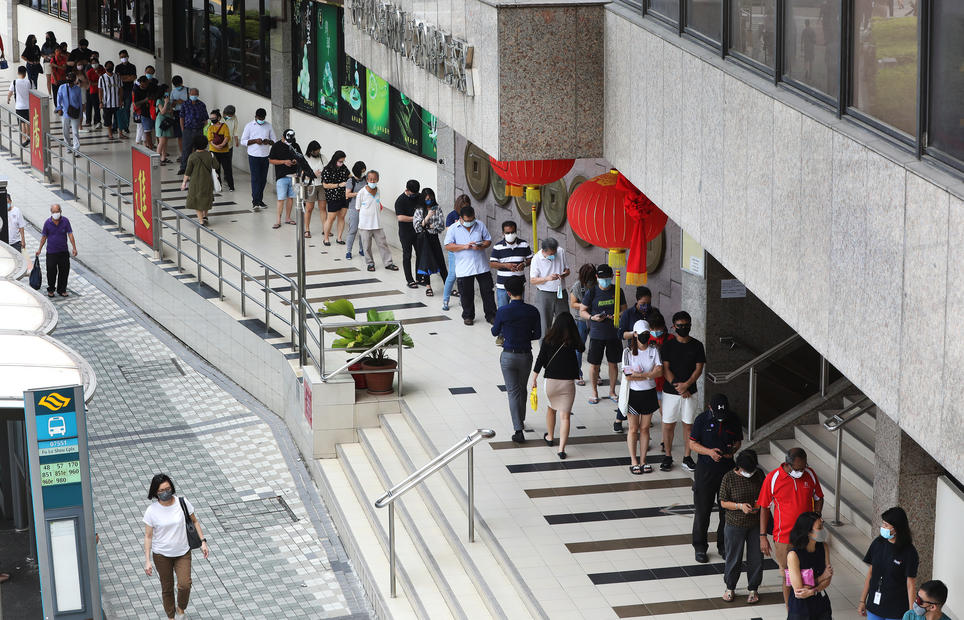 Lower Toto Hongbao jackpot not a deterrent for punters as snaking queues form outside betting outlets