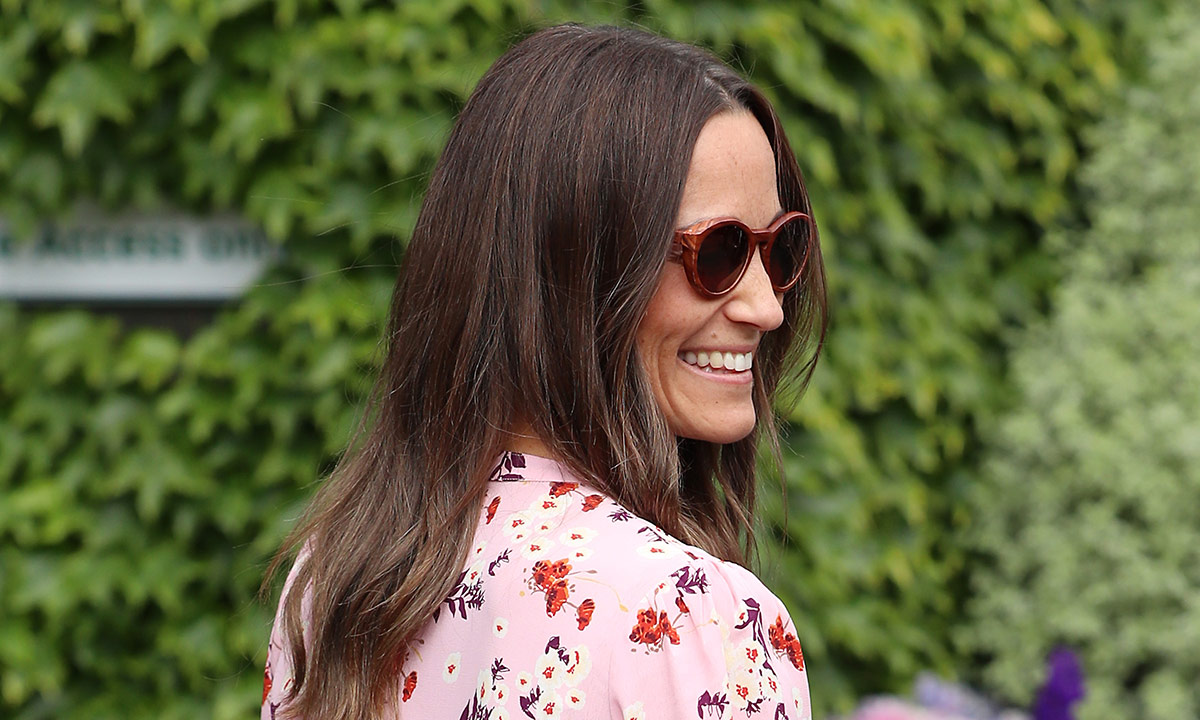 Pippa Middleton shows off blossoming baby bump on family day out with son