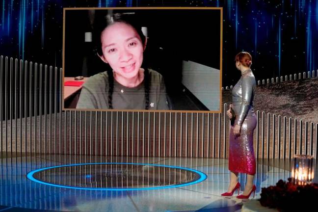 “Nomadland’ makes Globes history, as virtual gala honors late Boseman