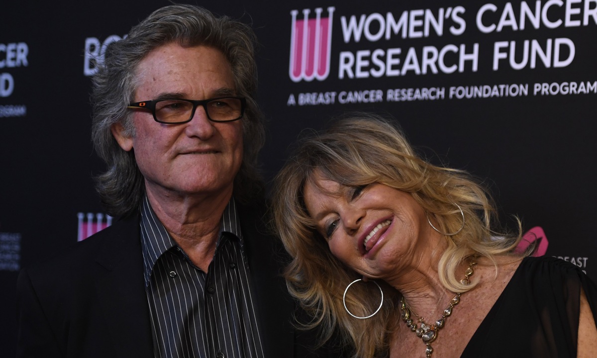 Goldie Hawn and Kurt Russell caught kissing in loved-up backstage photo - fans react