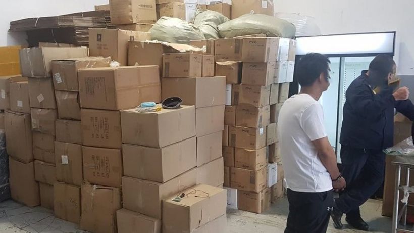 Covid: Police break up 'fake vaccine network' in China and South Africa