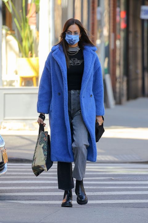 Irina Shayk Goes Punk in an Electric-Blue Overcoat and Distressed Denim in NYC