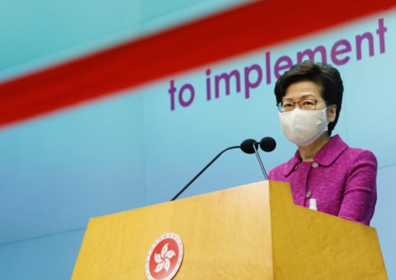 Hong Kong leader says China's planned electoral changes could prompt vote delay