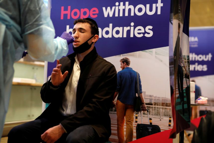 A quick swab and a boarding pass: Israeli airline launches check-in Covid-19 test