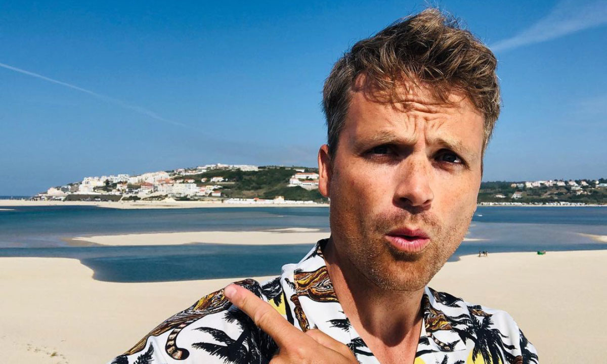 Ben Hillman defends himself over holiday snap without wife and children