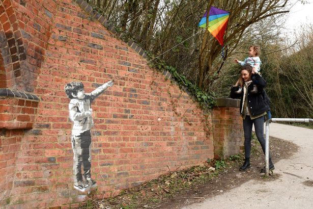 Suspected Banksy mural featuring child holding colourful kite pops up in Winchester
