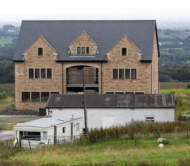 Five £1million luxury mansions face destruction after they were built 'too big'