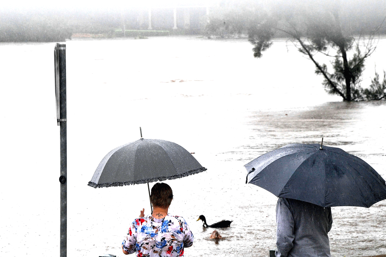 Evacuations ordered as dam overflows