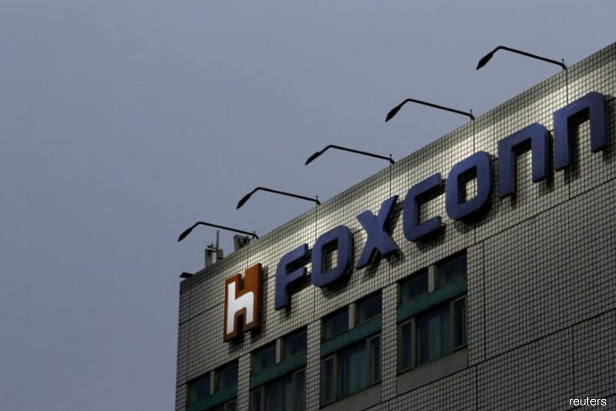 Foxconn iPhone India output drops 50% amid COVID surge - sources