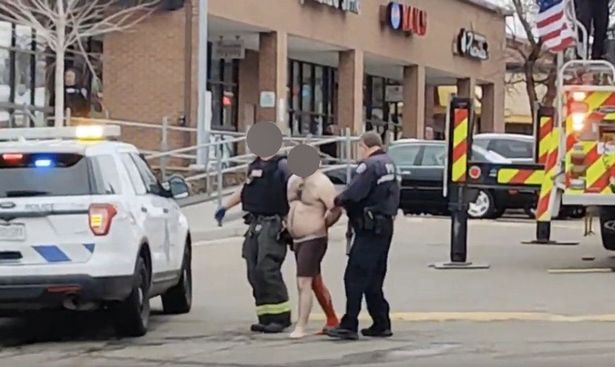 Gunman opens fire in supermarket car park before entering building as cops rush to scene