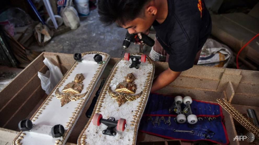 Thai coffin-maker kickflips his caskets into skateboards