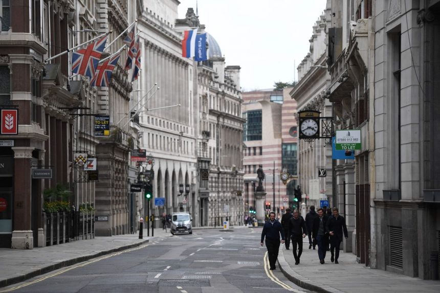British PM Johnson wins Parliament backing for plan to lift Covid-19 lockdown