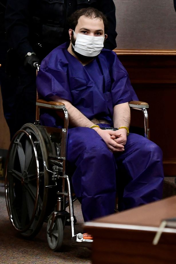 Boulder massacre suspect, 21, in court in wheelchair as 'mental illness' probed