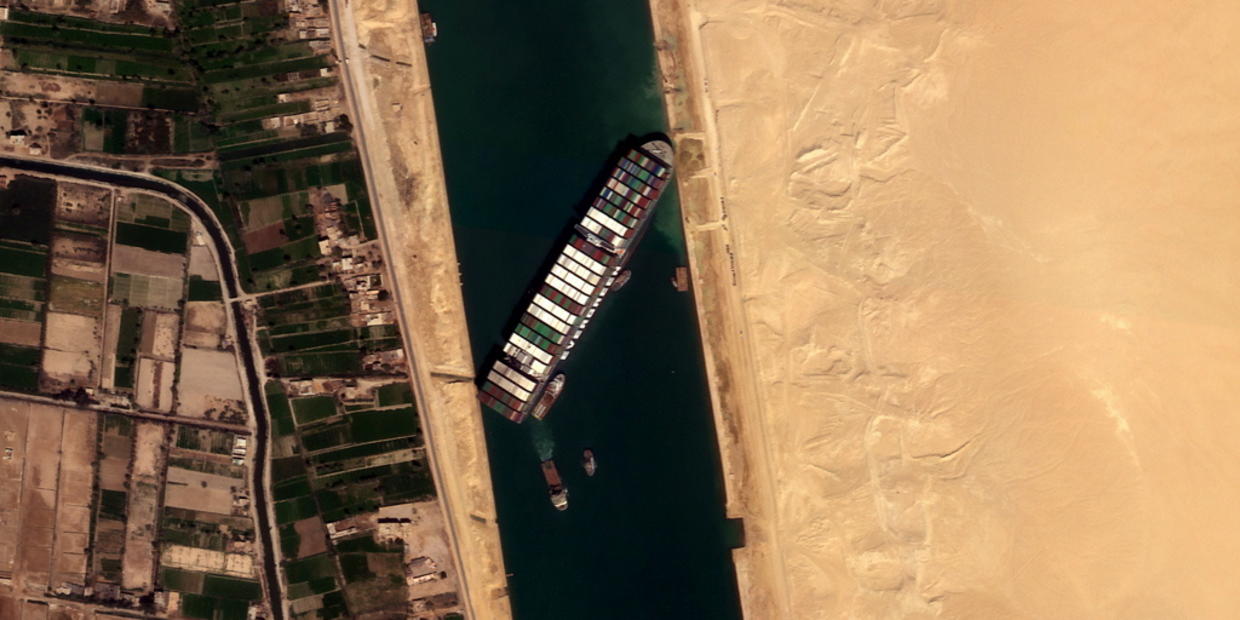 Tugs, dredgers still struggle to free ship blocking Suez Canal