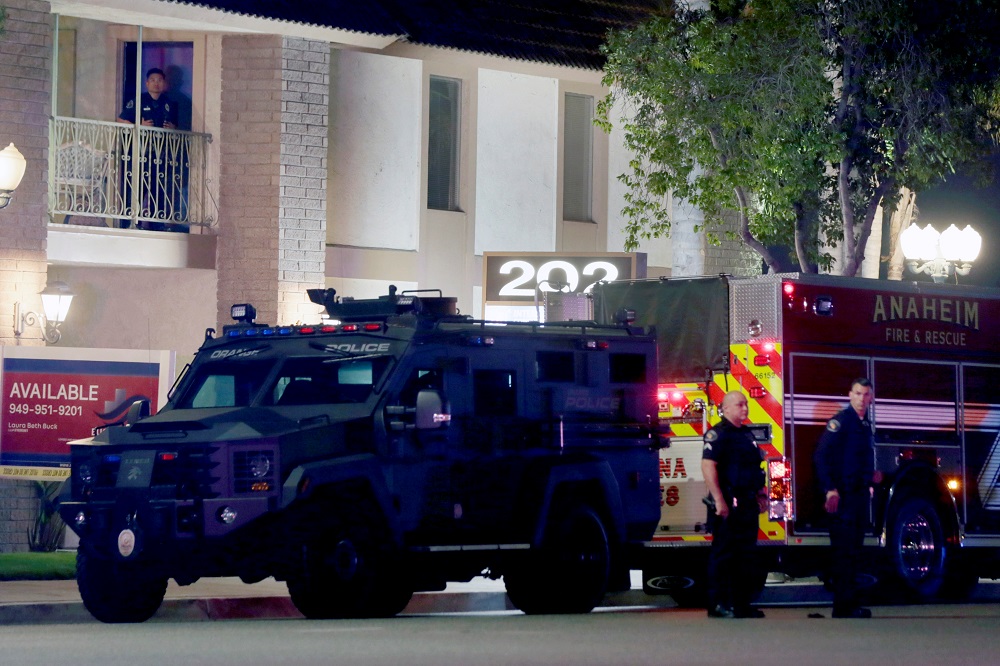 Mother wounded trying to shield nine-year-old son slain in California mass shooting