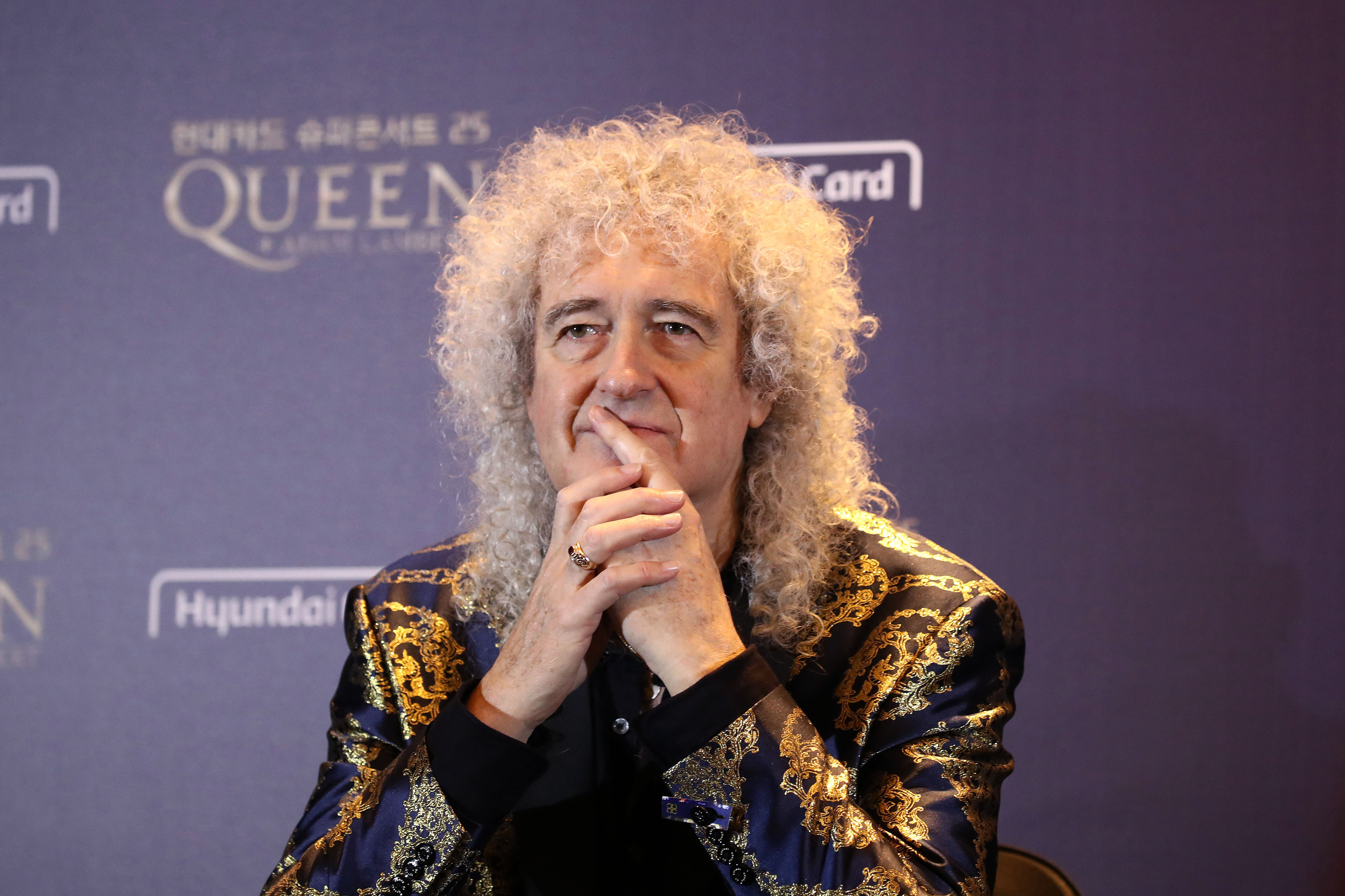 Brian May delays cricket match by landing helicopter in middle of pitch to attend Roger Taylor’s daughter’s wedding