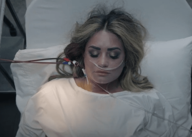 Demi Lovato relives near-fatal overdose in powerful video for Dancing with the Devil