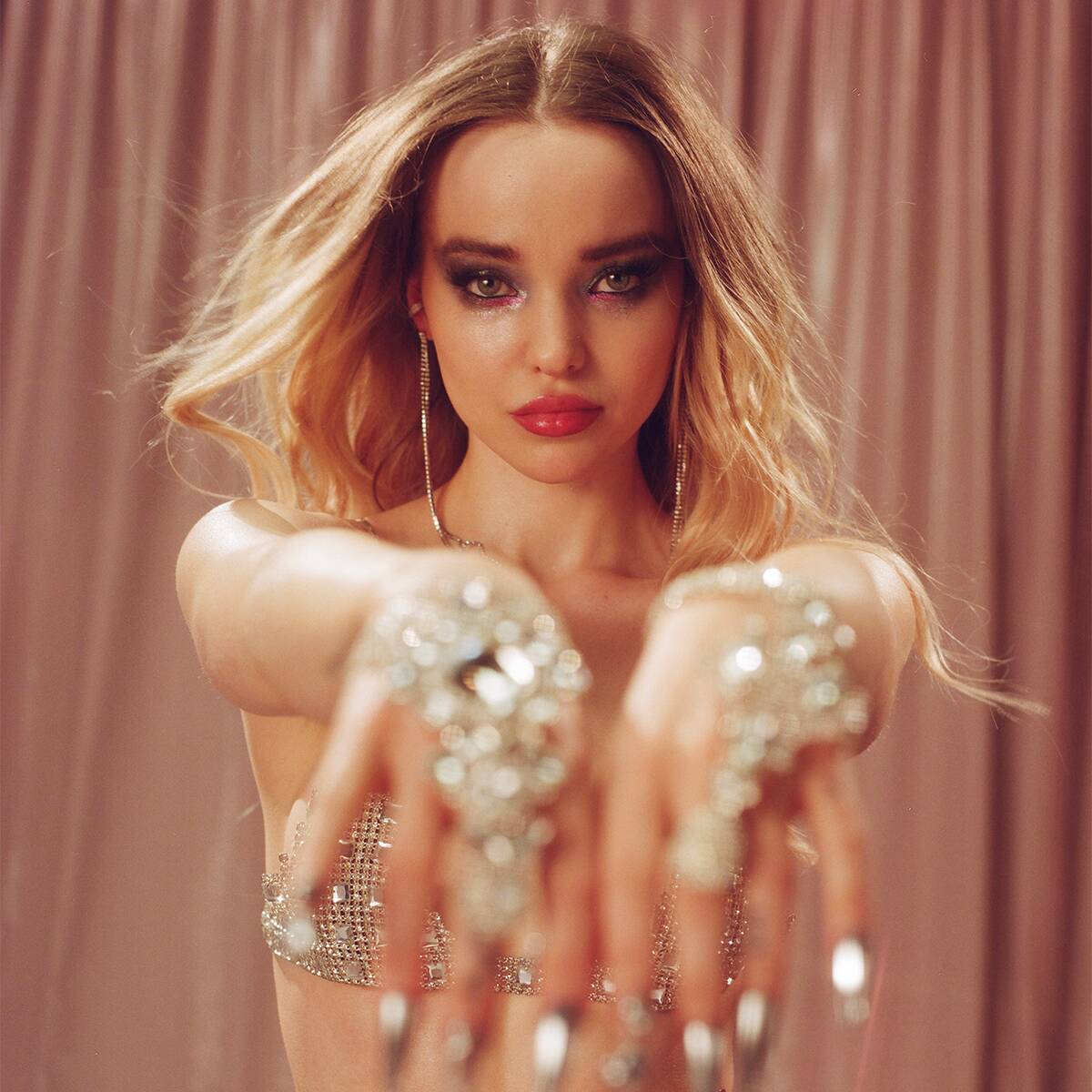 Watch Dove Cameron’s Steamy Kiss With Alexander 23 in New Music Video